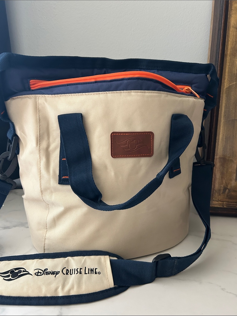 Disney Beige and Navy Men’s Toiletry Bag with Orange Accent
